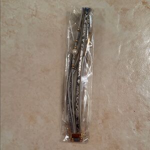 Elegant Multi-Strand Bracelet with Gold Accents